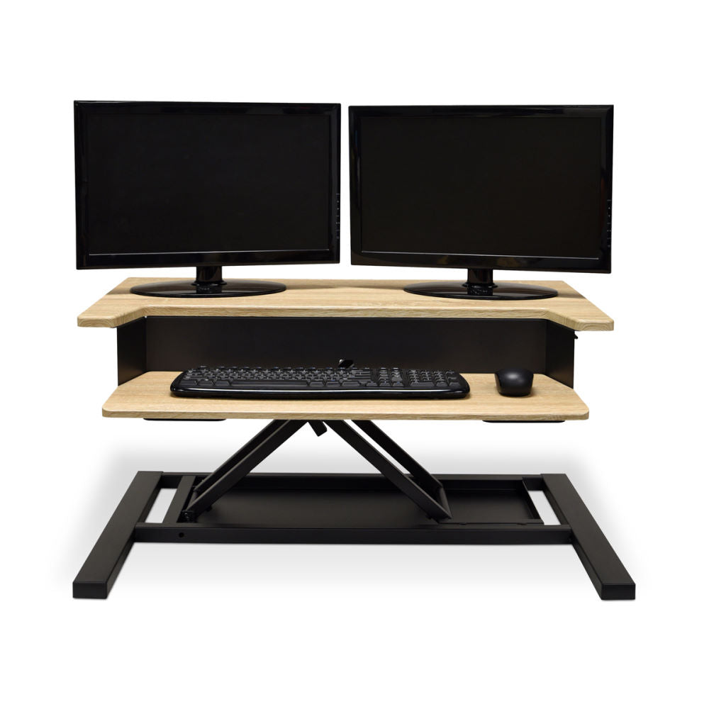 https://ergostandingdesks.com/cdn/shop/products/lvluppro32-wo_level-up-32-pro-standing-desk-converter-black-frame-white-oak-top-front-propped-raised_0_1024x1024@2x.jpg?v=1582075026